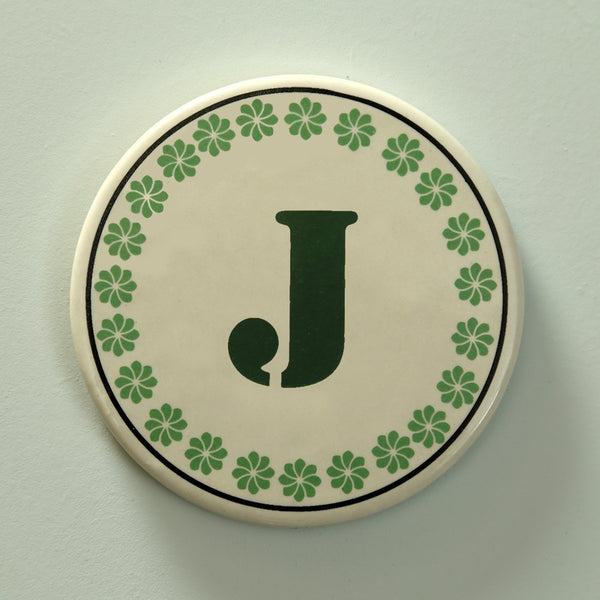 Monogram J coaster