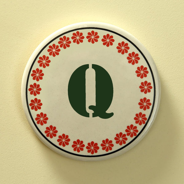 Monogram Q coaster