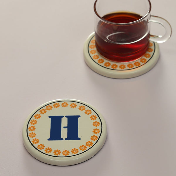 Monogram H coaster