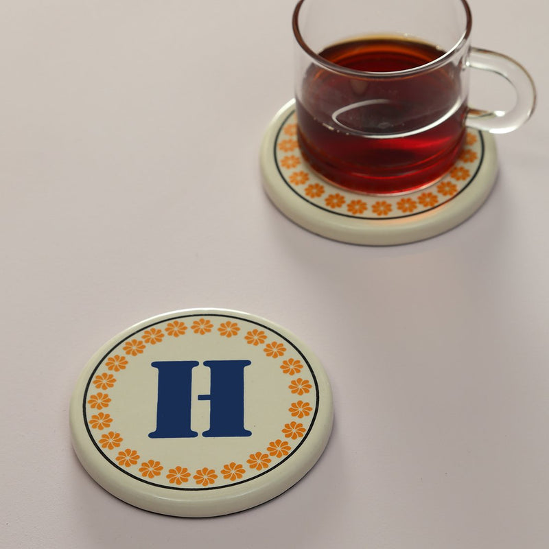 Monogram H coaster