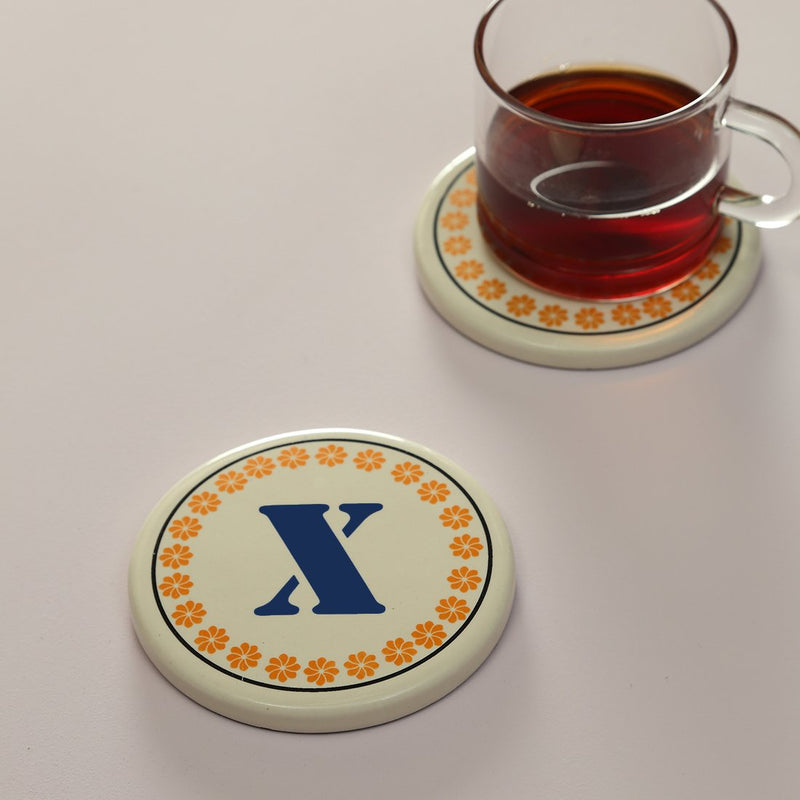 Monogram X coaster