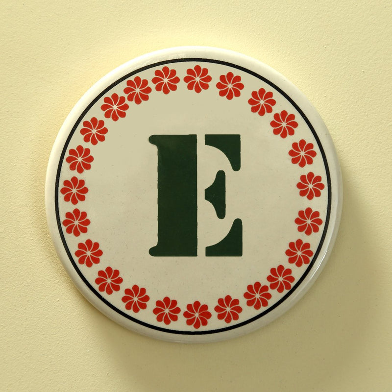 Monogram E coaster