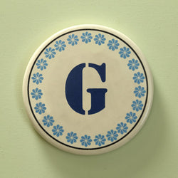 Monogram G coaster