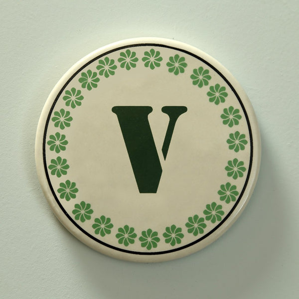 Monogram V coaster